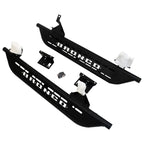Packaged view of cab length side steps for 2021-2023 Ford Bronco 2 door textured black with white Bronco lettering